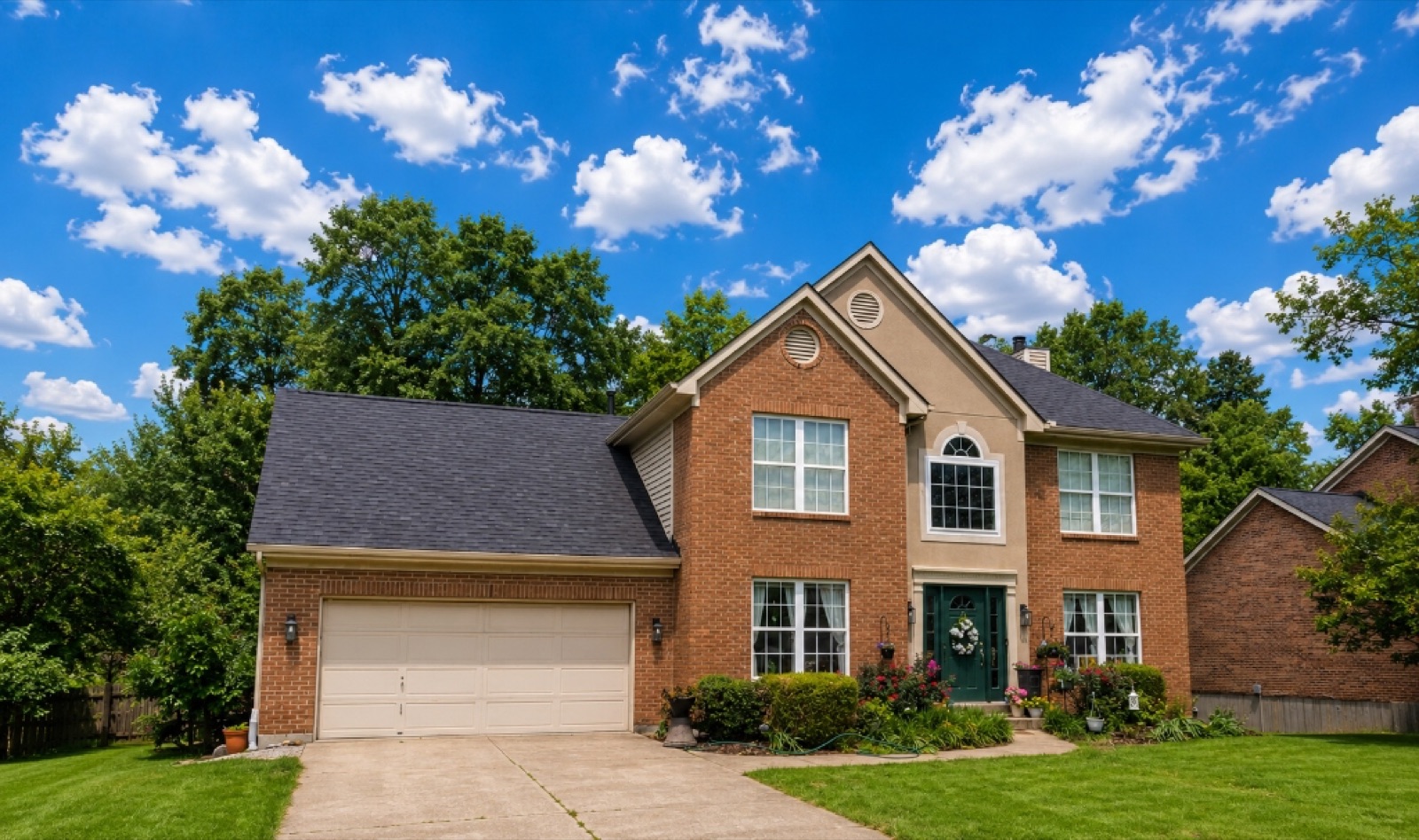 Beautiful house with a new roof and clean landscaping